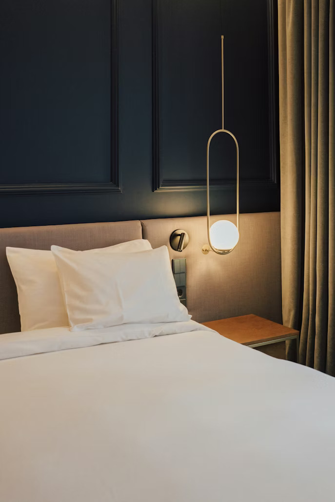 Luxury hotel bed with white linen
