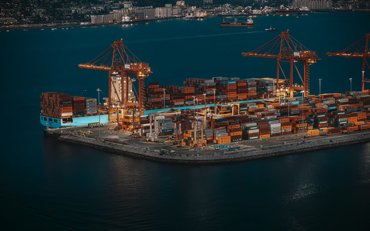 Container port at night — textile export logistics